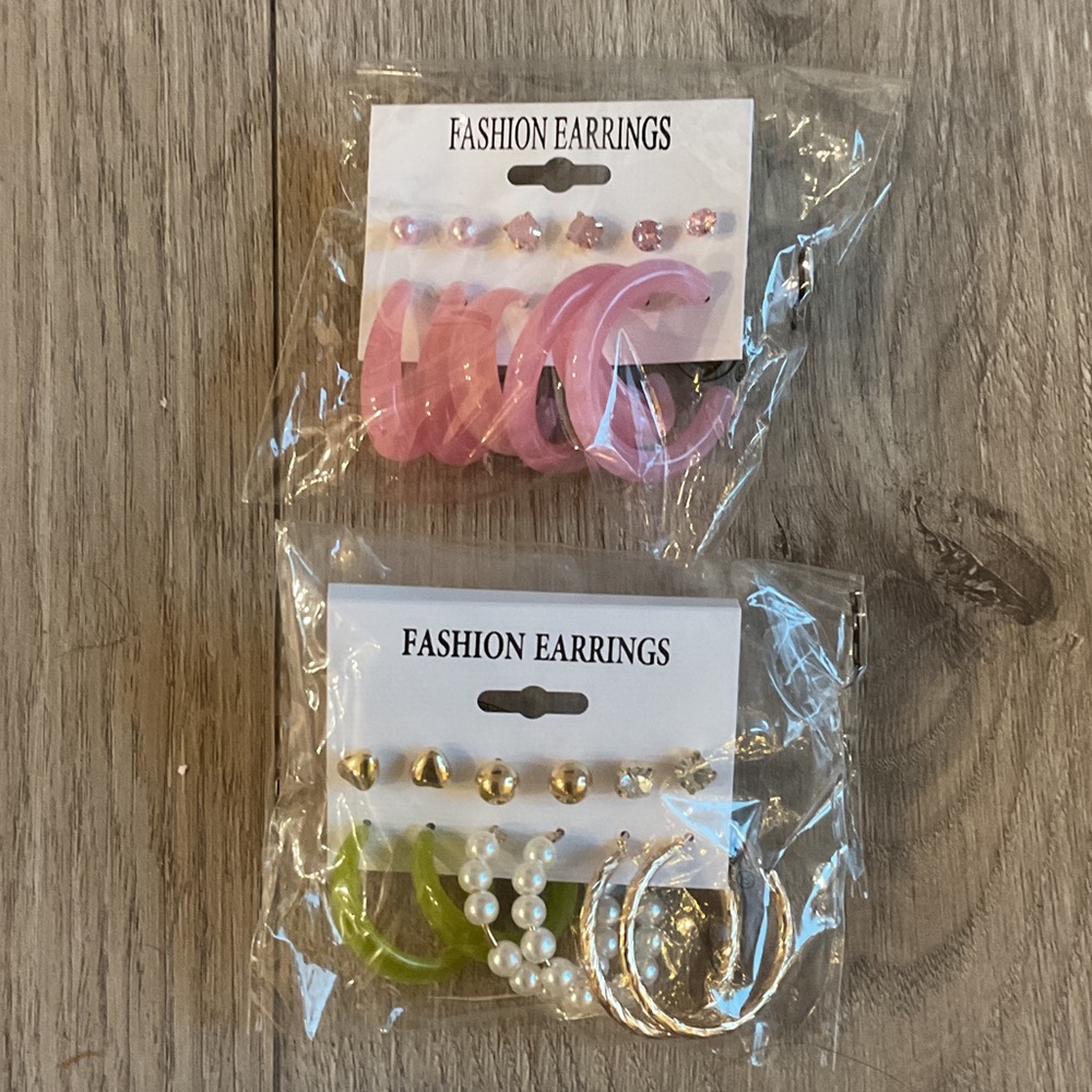 Fashion Earrings one pack pink and the other pack with white, gold, and jade.